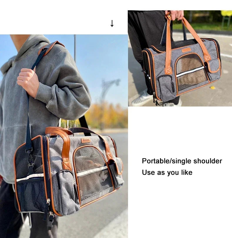 Pet carrier with shoulder strap and handle, shown being carried by a person.