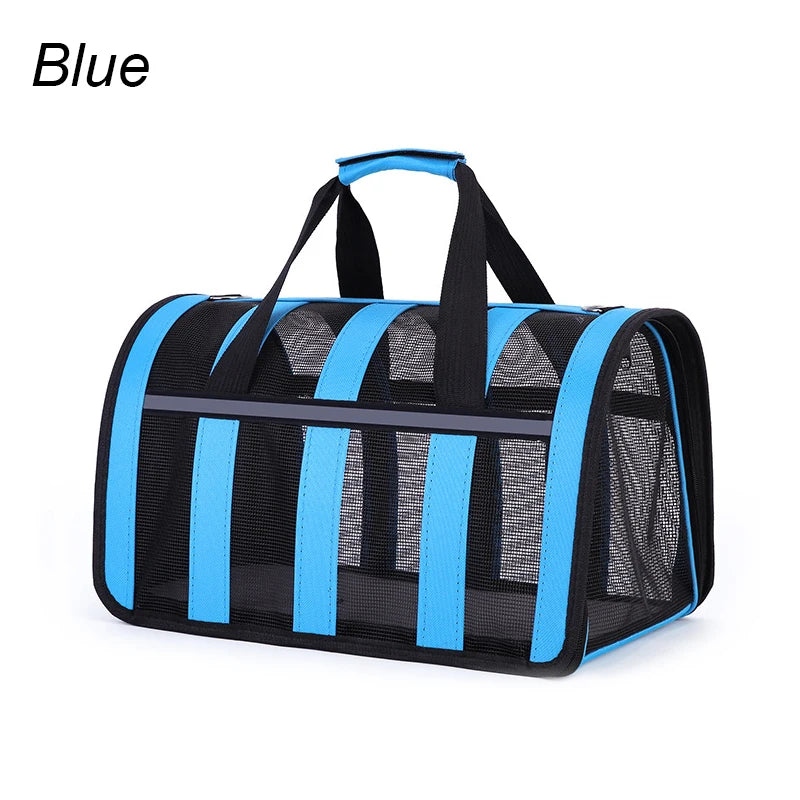 Blue and black pet carrier on a white background