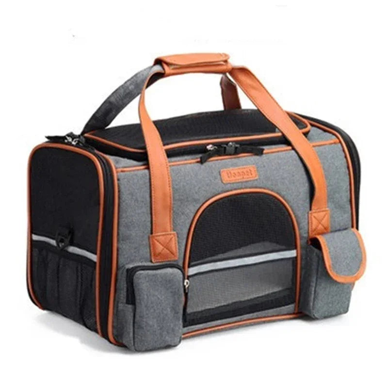 Gray and orange pet carrier with a visible brand logo on a white background